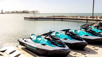 A jet ski dock with a clear view of the water and a distant shoreline.