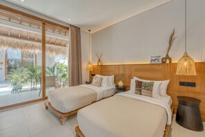 A hotel room with two beds, a large window, and a view of the outdoors. - Siroco Hotel Uluwatu (Pecatu)