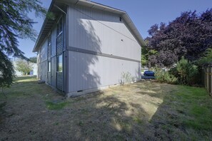 A single-story building with a gabled roof and a small porch. - Centrally Located Lacey Escape: 2 Mi to Hospital (Lacey)