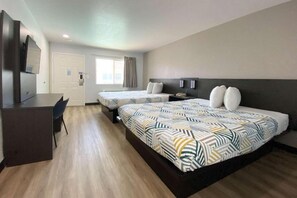 A hotel room with two beds, a desk, and a TV. - Spacious QueenBed|Pool,Free Parking (Costa Mesa)