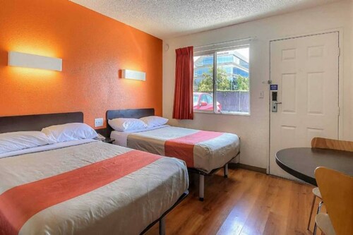 2 Full Beds | Mini Fridge