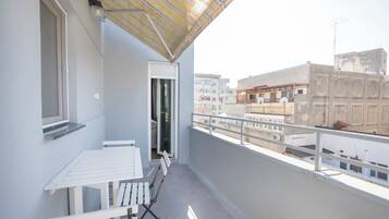 Apartment, 2 Bedrooms, Kitchen, City View | Outdoor dining