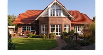 Cabin in Friedeburg with swimming pool