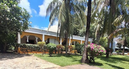 Exclusive Tropical Escape | Comfort Meets Coastal Charm. 5 Minutes to the beach.