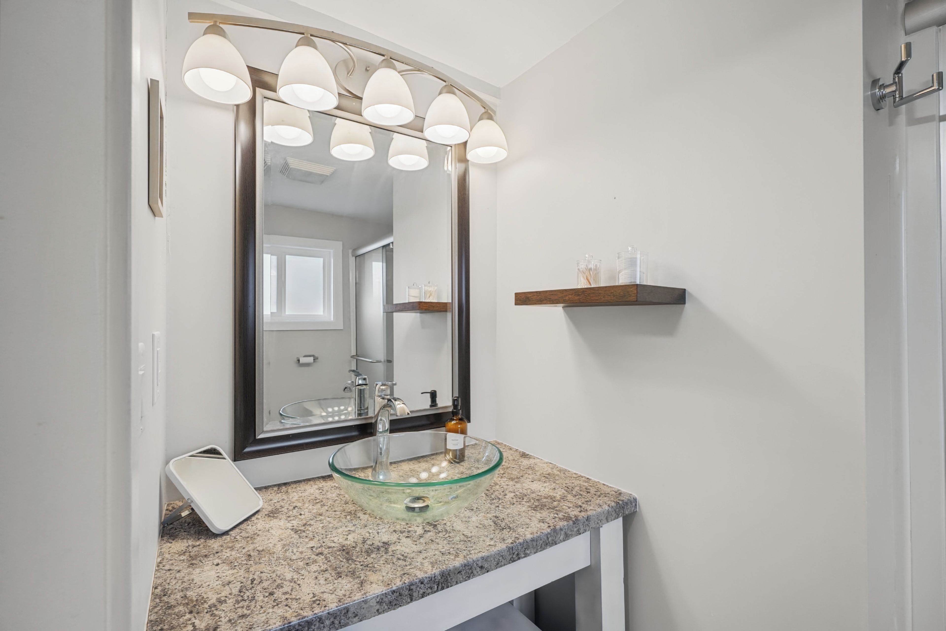 Simple and serene, this bathroom offers a peaceful space to reset.