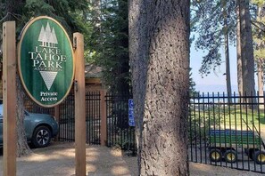 A sign for Lake Tahoe Park with a private access gate. - Aidenn’s Cabin - Walk to Tahoe Park Private Beach! (Tahoe City)