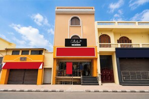 A building with a storefront featuring a sign that reads 'Collection & OVO-Served.' - Collection O Mall Of Avadh (Faizabad)