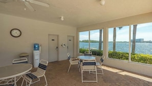 Outdoor dining - Sunrise Cove 130: Ground Floor Waterfront Condo on Siesta Key (Sarasota)