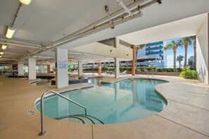A swimming pool area with a sign indicating no diving allowed. - Malibu Pointe 1001 -I/O Pools-Lazy River-4BR/4BA (North Myrtle Beach)