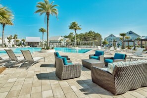 A poolside area with lounge chairs and a swimming pool. - Recovery Room | Steps from The Big Chill | Private Deck, Pools & Bikes (Inlet Beach)