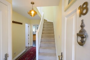 A staircase with carpeted steps leading to a second-floor landing. - Townhouse on the River, Decking & Private Parking (Bristol City)