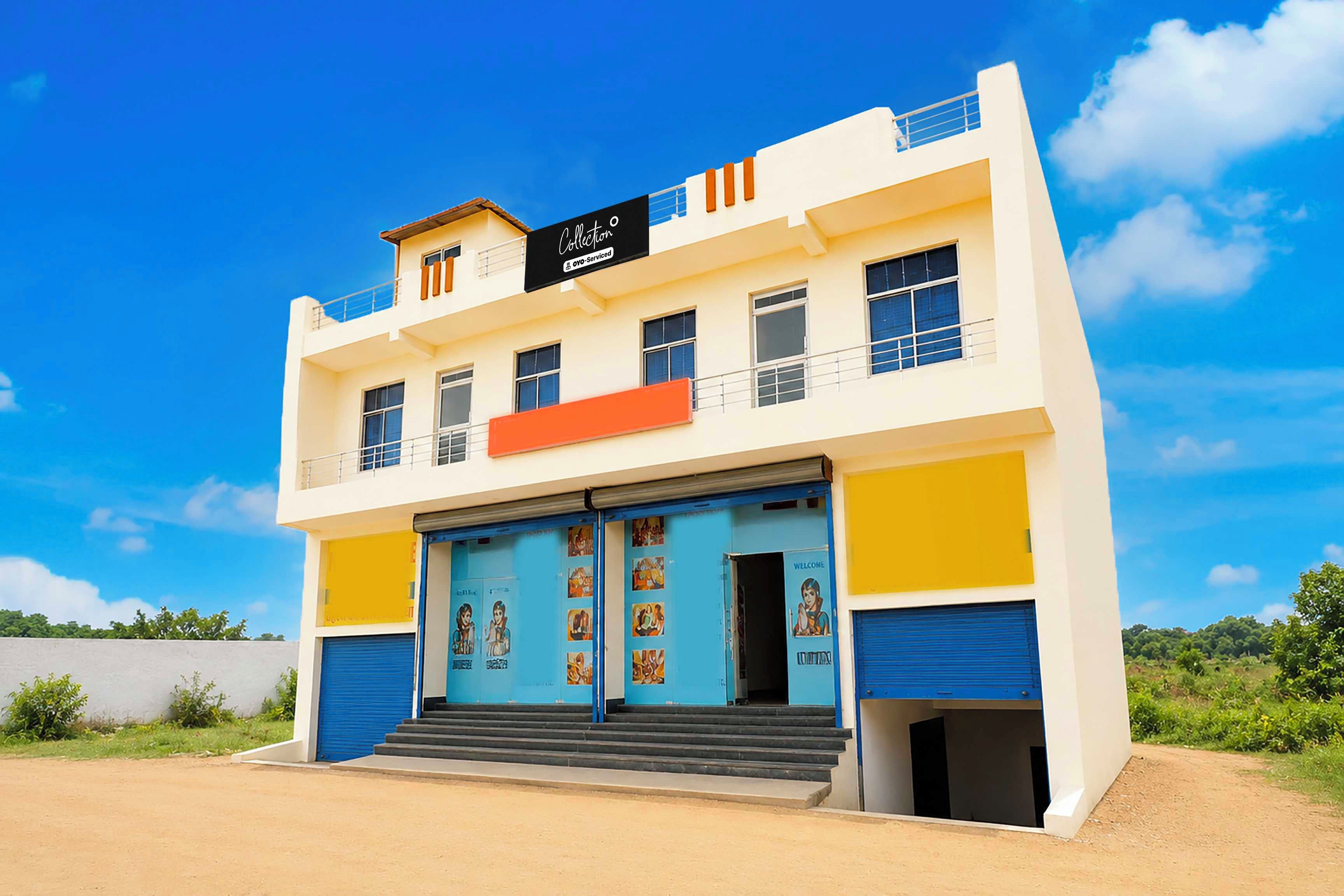 A two-story building with a sign reading 'Collection' and 'YOY-Serviced.'