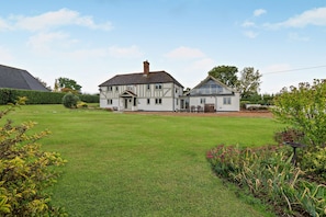 A two-story house with a large lawn in front. - Host & Stay | Yeoman's House (Old Wives Lees)