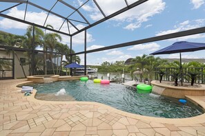 Unclassified image, 2 of 100, button - Sunset Shore Retreat – Pool, Dock & Home Theater (Cape Coral)