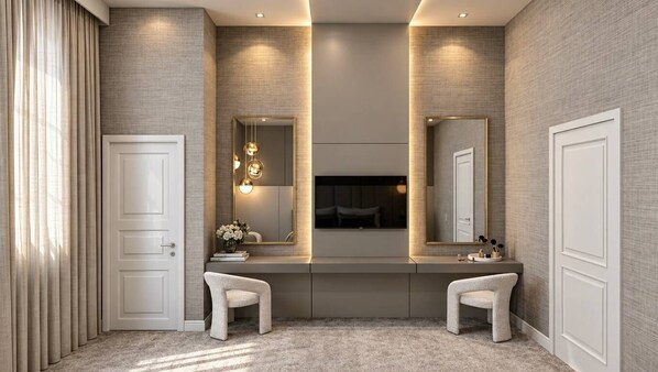 Un bagno moderno con un mobile lavabo, due specchi e un lampadario.