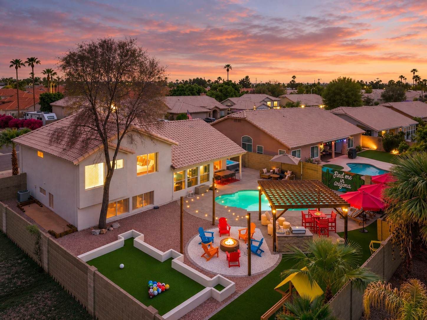 A residential area with houses, a swimming pool, and outdoor seating.