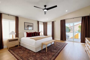 A spacious bedroom with a large bed, a ceiling fan, and a view to the outside. - Sundance - Private Pool - Mins to Kierland Commons (Scottsdale)