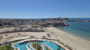 A coastal resort with a large pool, beachfront, and a view of the city. - 15th Floor Stunning Studio Condo in Sonoran Star (Puerto Peñasco)