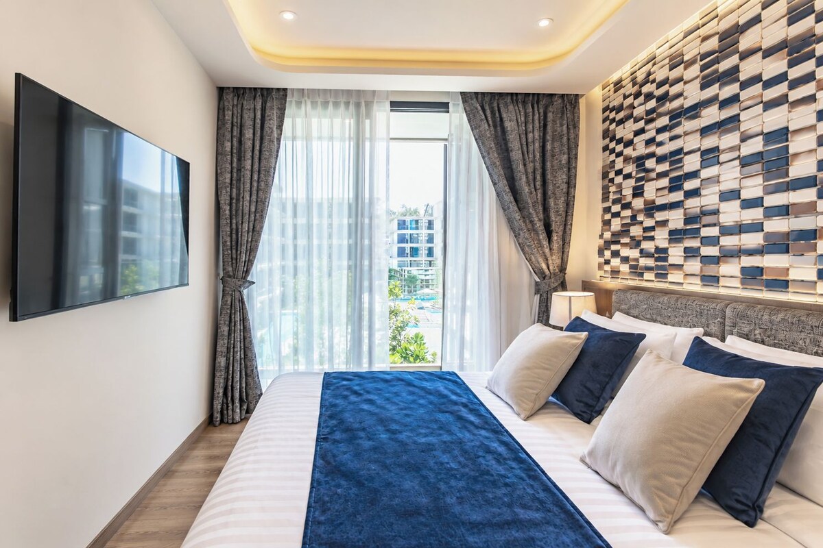 Tabla de planchar con plancha, wifi gratis y ropa de cama 