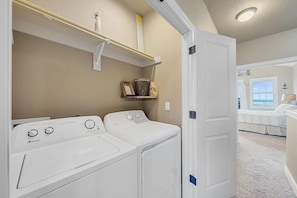 Laundry Closet – Located Between Upstairs Bedrooms — Easy access to laundry facilities right off the sleeping areas. - Ocean-View Coastal Retreat | Walk to Beach | Garage + EV Charging (Rockaway Beach)