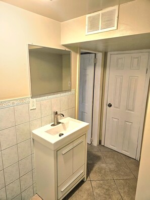 Unclassified image, 5 of 6, button - Spacious 2 bedroom Basement Apart |close to Airport (Toronto)