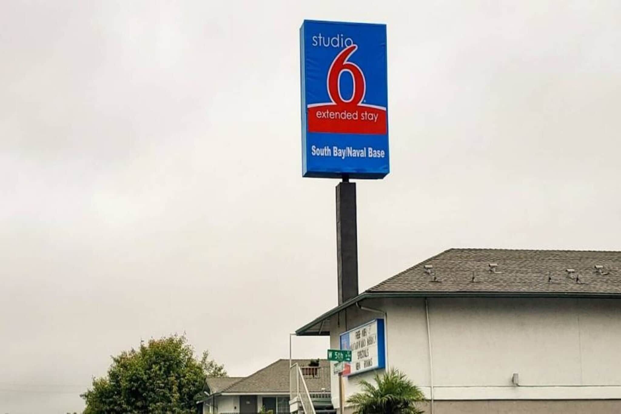 A sign for a Studio 6 extended stay hotel at South Bay/Naval Base.