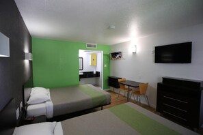 A hotel room with a bed, a desk, a chair, a television, and a wardrobe. - 2 Queen Beds | Non-Smoking, Kitchen (Barstow)