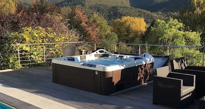 Villa with a hot tub, fireplace, and views of the Vosges