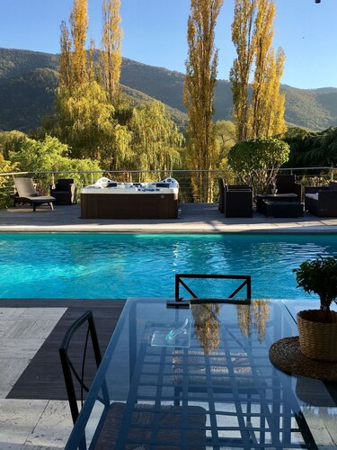 Villa with a hot tub, fireplace, and views of the Vosges