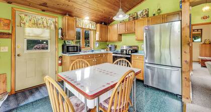 Comfy Chalet On 8 Private Acres with hiking trails, a secluded yard, and large back deck.