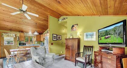 Comfy Chalet On 8 Private Acres with hiking trails, a secluded yard, and large back deck.