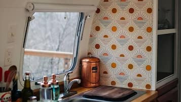 Kitchen sink with view onto deck.