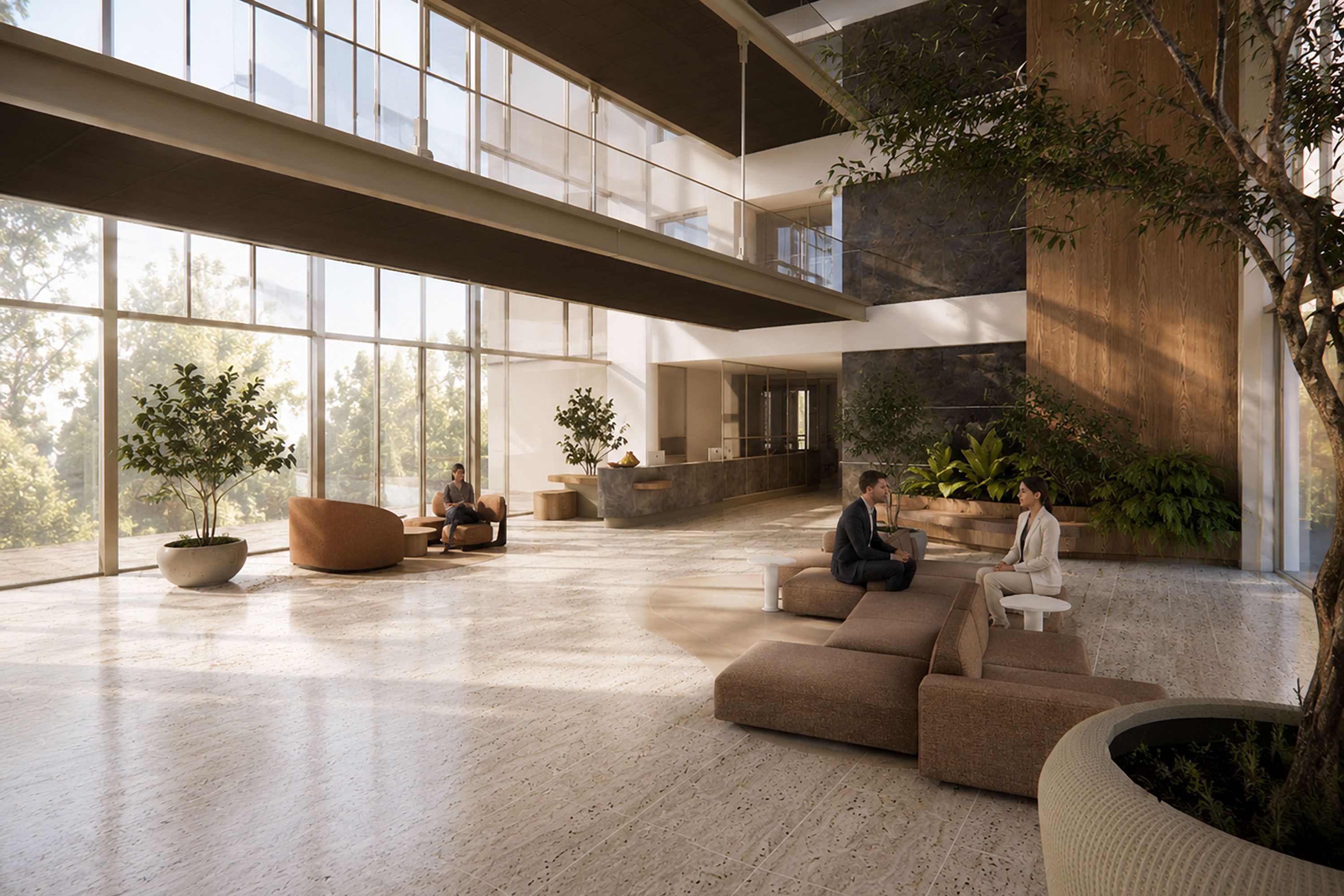 A spacious lobby with high ceilings, large windows, and a central seating area.