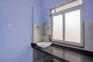 Deluxe Room | Bathroom | Shower, free toiletries, towels, soap - Collection O Bhumi World Industrial (Mumbai)