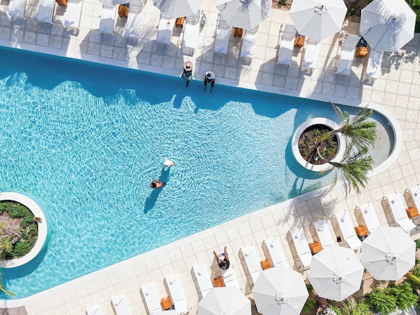 Dive into sparkling blue waters and sun-drenched loungers.
