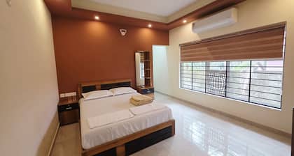 4-bedroom apartment in tranquil Kollam with AC comfort