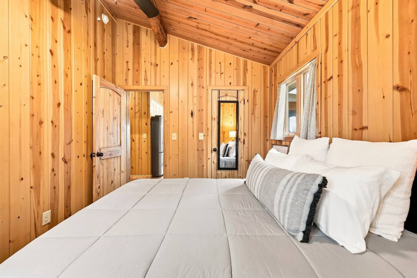 Guests can do a final outfit check in the full-length mirror before heading out for the day.