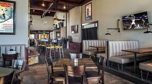 A restaurant interior with booths, tables, and a bar area. - Ski-In/Ski-Out Studio at Grand Timber Lodge, Sleeps 4 - New Year's Week (Breckenridge)