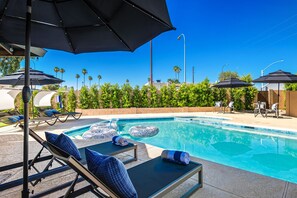 A swimming pool area with lounge chairs and umbrellas. - Heatwave HQ-Sport Court, Gym, Pool/SPA, Speakeasy (Scottsdale)