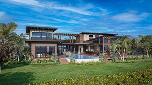 A modern two-story house with a swimming pool, surrounded by lush greenery and tropical plants. - Hale Ulua at Makahuena Estates - 6BR Luxury Oceanfront Home (Koloa)