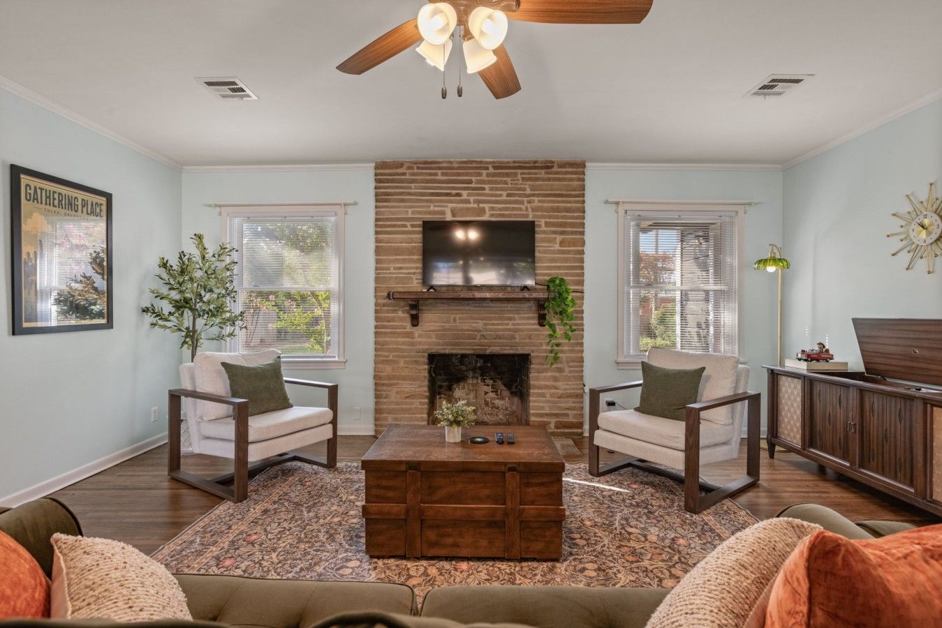 Mid-century living room with brick fireplace