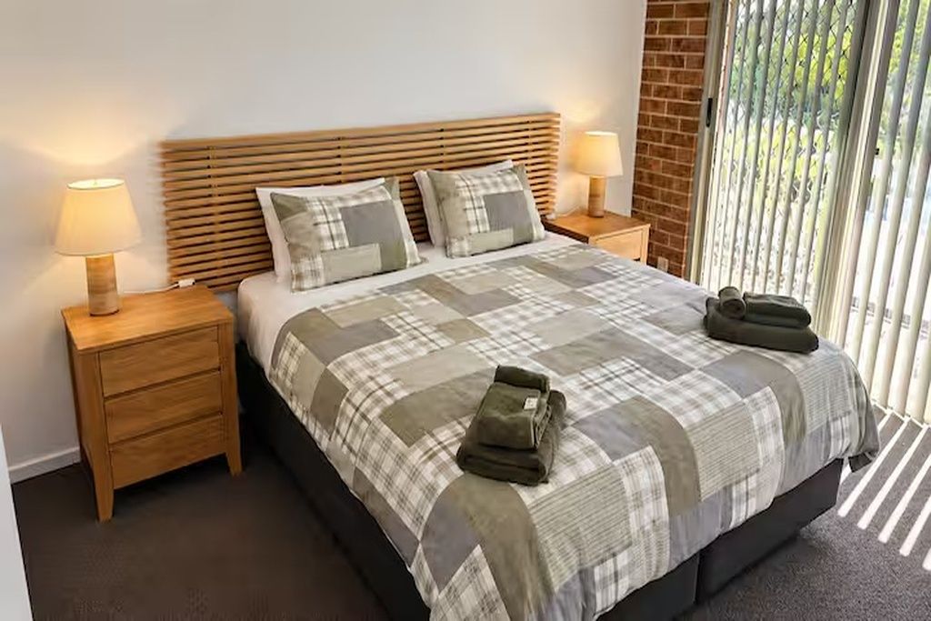 The main bedroom opens directly onto the balcony, 
