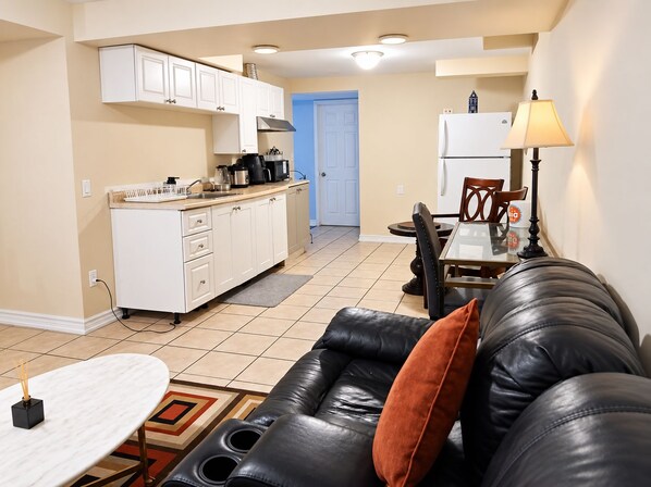 Unclassified image, 1 of 12, button - Private Suite | Queen Bed, Living Room & Entrance (Pickering)