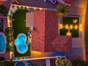 A rooftop pool area with a swimming pool, lounge chairs, and a red-roofed structure. - NEW Alta Mesa Retreat Pool Games More Sleeps 10 (Mesa)