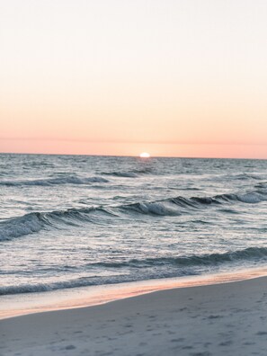 A beach with waves and a sunset. - NEW! Spacious Home, 3rd Fl Patio and Bar w/ Costal View! (Panama City)