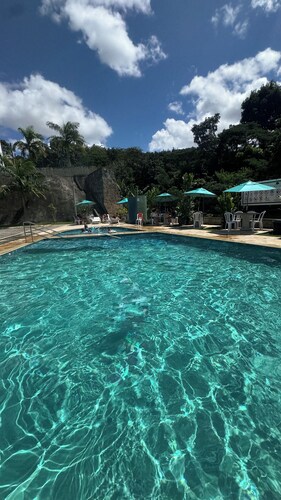 Room with pool view in gated community