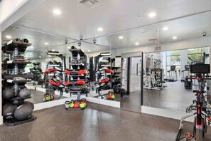 A modern gym with various exercise equipment, mirrors, and a clean, spacious layout. - Walk to Kierland | Dining+ Pool + Hot Tub | Westin (Scottsdale)