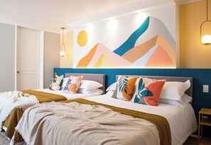 A bedroom with a bed, pillows, and a wall art piece. - Walk Polanco, luminous, safe, lots of space & love (Mexico City)