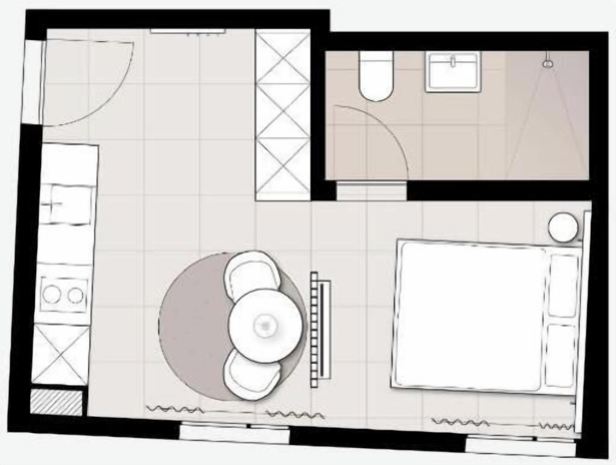 Plano de planta con cocina, comedor y baño.