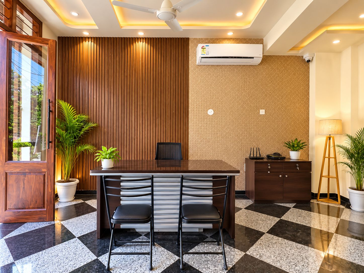A conference room with a wooden panel wall, a ceiling fan, an air conditioning unit, and a checkered floor.